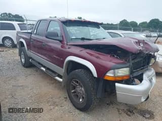 ✅ 2002 Dodge Dakota SLT • VIN: 1B7HG48N72S534240 • Лот: 42718329. Опубликован ранее на IAAI с пробегом 176 675 миль. Бесплатный доступ к архиву аукционных продаж из США и подробный отчёт об истории автомобиля на DreamBid. Изображение 1.