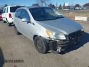 ✅ 2009 Chevrolet Aveo 1LT • VIN: KL1TD66E89B652879 • Lot: 43696256. Wystawiony na IAAI z przebiegiem 128 321 mil. Bezpłatny archiwum sprzedaży aukcyjnych z USA i szczegółowy raport historii pojazdu na DreamBid. Zdjęcie 1.