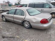 ✅ 2002 Lincoln Continental • VIN: 1LNHM97V32Y627465 • Lot: 41744638. Listed on IAAI with 173,759 mi. Free auction sales archive from the USA and detailed vehicle history report at DreamBid. Image 3.