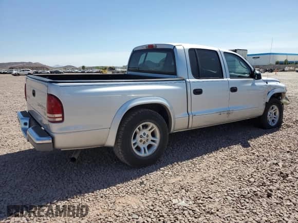 2004 Dodge Dakota SLT z VIN 1D7HL48N94S717644, wystawiony jako Copart lot #71394124 z przebiegiem 155 892 mil mil oraz Szkoda całkowita • Salvage title. Historia ofert i sprzedaży dostępna na DreamBid. Obrazek 3.