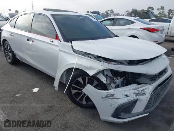 ✅ 2024 Honda Civic Sport Touring • VIN: 19XFL1G80RE001267 • Lot: 42986723. Wystawiony na IAAI z przebiegiem 9 601 mil. Bezpłatny archiwum sprzedaży aukcyjnych z USA i szczegółowy raport historii pojazdu na DreamBid. Zdjęcie 1.