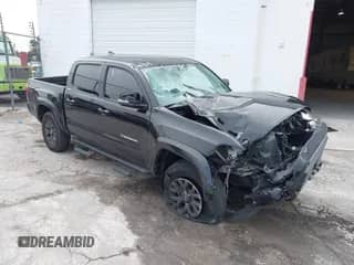 2022 Toyota Tacoma SR5 with VIN 3TMAZ5CN1NM160441, listed as a IAAI auction lot 42433590 with 46,216 mi miles and . Bid and sale history available at DreamBid. Image 1.