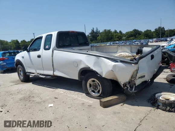 ✅ 2000 Ford F-150 XL • VIN: 1FTRX18L9YNB88412 • Lot: 69318865. Wystawiony na Copart z przebiegiem Nie podano. Bezpłatny archiwum sprzedaży aukcyjnych z USA i szczegółowy raport historii pojazdu na DreamBid. Zdjęcie 2.