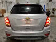 ✅ 2022 Chevrolet Trax LT • VIN: KL7CJPSM1NB525211 • Lot: 85825315. Listed on Copart with 77,332 mi. Free auction sales archive from the USA and detailed vehicle history report at DreamBid. Image 6.