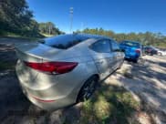 ✅ 2017 Hyundai Elantra SE • VIN: 5NPD84LF0HH011323 • Lot: 93139205. Listed on Copart with 118,411 mi. Free auction sales archive from the USA and detailed vehicle history report at DreamBid. Image 4.