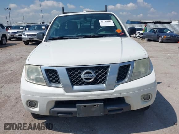 ✅ 2018 Nissan Frontier SV • VIN: 1N6DD0ER2JN707311 • Lot: 43123082. Listed on IAAI with 235,627 mi. Free auction sales archive from the USA and detailed vehicle history report at DreamBid. Image 12.