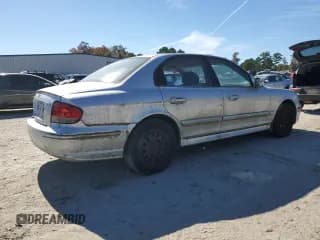 ✅ 2003 Hyundai Sonata • VIN: KMHWF25SX3A818800 • Lot: 82638495. Listed on Copart with 127,008 mi. Free auction sales archive from the USA and detailed vehicle history report at DreamBid. Image 3.