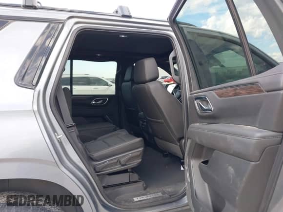 2022 Chevrolet Tahoe Z71 z VIN 1GNSKPKD2NR309121, wystawiony jako IAAI lot #41352421 z przebiegiem 18 933 mil mil oraz . Historia ofert i sprzedaży dostępna na DreamBid. Obrazek 8.