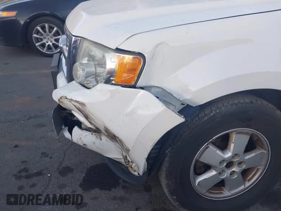 ✅ 2012 Ford Escape XLS • VIN: 1FMCU0C73CKA59607 • Lot: 43654992. Wystawiony na IAAI z przebiegiem 203 150 mil. Bezpłatny archiwum sprzedaży aukcyjnych z USA i szczegółowy raport historii pojazdu na DreamBid. Zdjęcie 6.