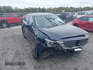 ✅ 2021 Mazda CX-9 Touring • VIN: JM3TCBCYXM0521709 • Lot: 43452547. Listed on IAAI with 50,115 mi. Free auction sales archive from the USA and detailed vehicle history report at DreamBid. Image 1.