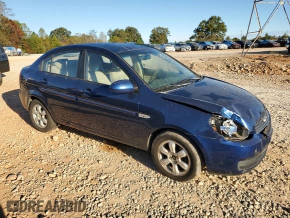 2007 Hyundai Accent GLS with VIN KMHCN46C37U127752, listed as a Copart auction lot 76196714 with 186,581 mi miles and Salvage title. Bid and sale history available at DreamBid. Image 4.