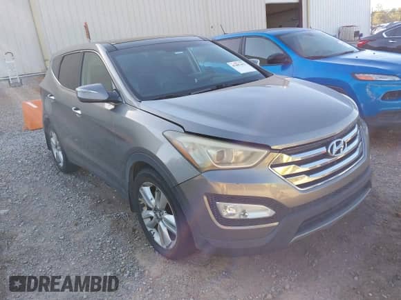 2013 Hyundai Santa Fe Sport z VIN 5XYZW3LA2DG022738, wystawiony jako IAAI lot #43487493 z przebiegiem 169 663 mil mil oraz . Historia ofert i sprzedaży dostępna na DreamBid. Obrazek 1.
