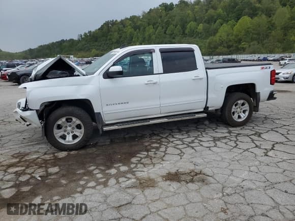 ✅ 2018 Chevrolet Silverado 1500 LT • VIN: 3GCUKREC5JG401737 • Лот: 70502254. Опубликован ранее на Copart с пробегом Не указан. Бесплатный доступ к архиву аукционных продаж из США и подробный отчёт об истории автомобиля на DreamBid. Изображение 1.