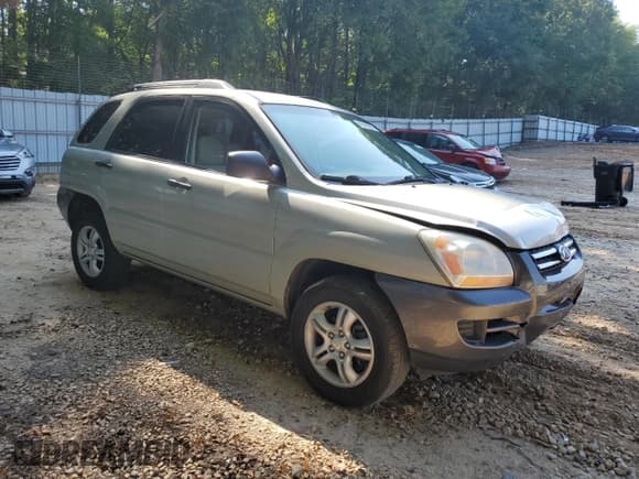 ✅ 2008 Kia Sportage LX • VIN: KNDJF723987507503 • Lot: 69040095. Listed on Copart with 164,137 mi. Free auction sales archive from the USA and detailed vehicle history report at DreamBid. Image 4.