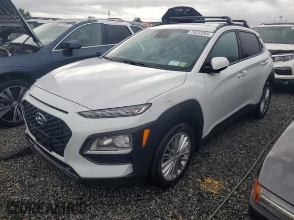✅ 2021 Hyundai Kona SEL • VIN: KM8K2CAA6MU672196 • Лот: 74233264. Опубликован ранее на Copart с пробегом Не указан. Бесплатный доступ к архиву аукционных продаж из США и подробный отчёт об истории автомобиля на DreamBid. Изображение 1.