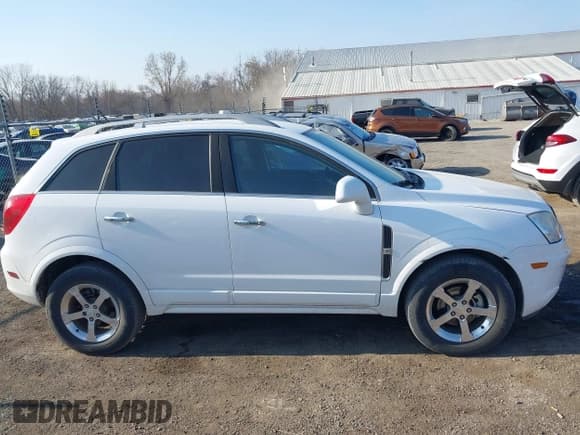 ✅ 2014 Chevrolet Captiva Sport LT • VIN: 3GNAL3EK8ES557432 • Lot: 42018256. Wystawiony na IAAI z przebiegiem 92 569 mil. Bezpłatny archiwum sprzedaży aukcyjnych z USA i szczegółowy raport historii pojazdu na DreamBid. Zdjęcie 13.