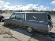 ✅ 1988 Cadillac Brougham • VIN: 1G6DW51Y2J9714052 • Lot: 77274064. Wystawiony na Copart z przebiegiem 69 106 mil. Bezpłatny archiwum sprzedaży aukcyjnych z USA i szczegółowy raport historii pojazdu na DreamBid. Zdjęcie 2.