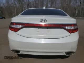 2013 Hyundai Azera с VIN KMHFG4JG2DA250554, выставлен на аукционе Copart как лот 48107855 с пробегом 137 427 миль миль и Списание • Salvage title. История ставок и продаж доступна на DreamBid. Изображение 6.