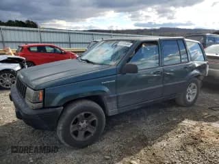 ✅ 1993 Jeep Grand Cherokee Laredo • VIN: 1J4GZ58S4PC580315 • Lot: 85105304. Listed on Copart with 202,460 mi. Free auction sales archive from the USA and detailed vehicle history report at DreamBid. Image 1.