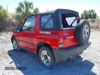 ✅ 1998 Chevrolet Tracker • VIN: 2CNBE1866W6924835 • Лот: 41821459. Опубликован ранее на IAAI с пробегом 54 512 миль. Бесплатный доступ к архиву аукционных продаж из США и подробный отчёт об истории автомобиля на DreamBid. Изображение 3.