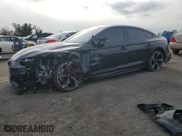 ✅ 2022 Audi RS 5 Sportback • VIN: WUAAWCF50NA902918 • Lot: 87485234. Listed on Copart with 33,427 mi. Free auction sales archive from the USA and detailed vehicle history report at DreamBid. Image 1.