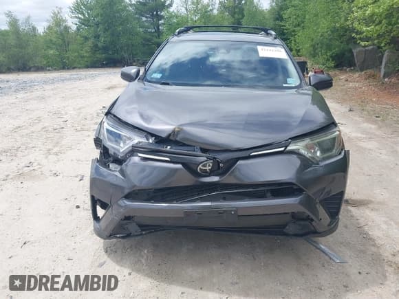 ✅ 2018 Toyota RAV4 LE • VIN: JTMBFREV9JJ742196 • Lot: 42242296. Listed on IAAI with 97,479 mi. Free auction sales archive from the USA and detailed vehicle history report at DreamBid. Image 12.