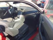 ✅ 2010 Hyundai Genesis Coupe • VIN: KMHHT6KD2AU009804 • Lot: 43347469. Listed on IAAI with 141,348 mi. Free auction sales archive from the USA and detailed vehicle history report at DreamBid. Image 5.