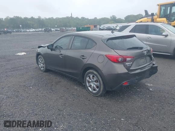 ✅ 2014 Mazda 3 i Sport • VIN: JM1BM1K7XE1214332 • Lot: 43243473. Listed on IAAI with 104,994 mi. Free auction sales archive from the USA and detailed vehicle history report at DreamBid. Image 3.