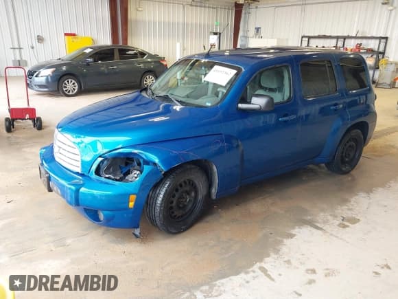 ✅ 2010 Chevrolet HHR LS • VIN: 3GNBAADB7AS548540 • Lot: 41652362. Listed on IAAI with 199,534 mi. Free auction sales archive from the USA and detailed vehicle history report at DreamBid. Image 2.