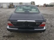 ✅ 2003 Jaguar XJ Vanden Plas • VIN: SAJDA24C33LF52131 • Лот: 84263554. Опубликован ранее на Copart с пробегом Не указан. Бесплатный доступ к архиву аукционных продаж из США и подробный отчёт об истории автомобиля на DreamBid. Изображение 6.