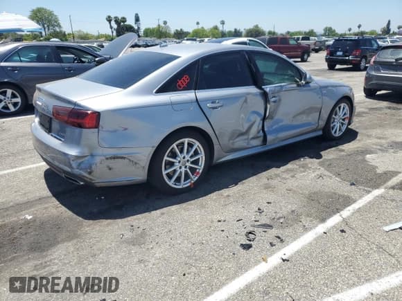 ✅ 2018 Audi A6 Premium Plus • VIN: WAUG8AFC7JN016373 • Лот: 58823565. Опубликован ранее на Copart с пробегом 39 963 миль. Бесплатный доступ к архиву аукционных продаж из США и подробный отчёт об истории автомобиля на DreamBid. Изображение 3.