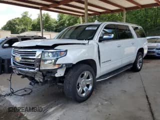 ✅ 2020 Chevrolet Suburban Premier • VIN: 1GNSCJKCXLR173500 • Lot: 64714885. Wystawiony na Copart z przebiegiem 91 915 mil. Bezpłatny archiwum sprzedaży aukcyjnych z USA i szczegółowy raport historii pojazdu na DreamBid. Zdjęcie 1.