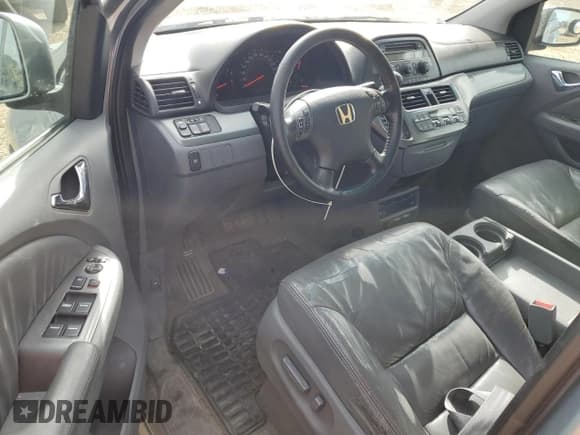 ✅ 2007 Honda Odyssey EX-L • VIN: 5FNRL38747B017459 • Lot: 85887845. Listed on Copart with 252,708 mi. Free auction sales archive from the USA and detailed vehicle history report at DreamBid. Image 8.