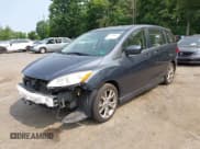 ✅ 2012 Mazda 5 Touring • VIN: JM1CW2CL5C0126744 • Lot: 42385667. Listed on IAAI with 140,150 mi. Free auction sales archive from the USA and detailed vehicle history report at DreamBid. Image 2.