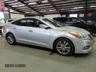 ✅ 2012 Hyundai Azera • VIN: KMHFG4JGXCA125557 • Лот: 80189105. Опубликован ранее на Copart с пробегом 134 948 миль. Бесплатный доступ к архиву аукционных продаж из США и подробный отчёт об истории автомобиля на DreamBid. Изображение 4.