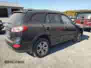 2012 Hyundai Santa Fe SE с VIN 5XYZHDAG2CG127768, выставлен на аукционе Copart как лот 77075924 с пробегом 149 980 миль миль и Чистый • Clean title. История ставок и продаж доступна на DreamBid. Изображение 3.