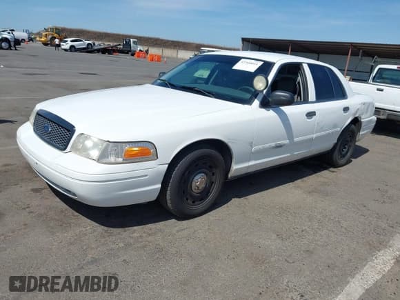 ✅ 2003 Ford Police Interceptor Street Appear • VIN: 2FAHP71W83X210044 • Lot: 42360011. Listed on IAAI with 183,569 mi. Free auction sales archive from the USA and detailed vehicle history report at DreamBid. Image 2.