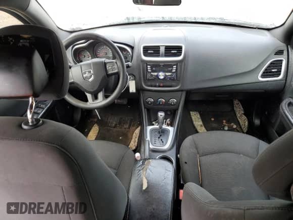 2013 Dodge Avenger SE z VIN 1C3CDZAB0DN592146, wystawiony jako Copart lot #82248105 z przebiegiem 219 706 mil mil oraz Szkoda całkowita • Salvage title. Historia ofert i sprzedaży dostępna na DreamBid. Obrazek 8.