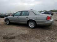 ✅ 2001 Ford Crown Victoria LX • VIN: 2FAFP74W11X165559 • Lot: 85911855. Wystawiony na Copart z przebiegiem 132 531 mil. Bezpłatny archiwum sprzedaży aukcyjnych z USA i szczegółowy raport historii pojazdu na DreamBid. Zdjęcie 2.