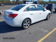 ✅ 2015 Chevrolet Cruze LT • VIN: 1G1PE5SB9F7295443 • Lot: 43631258. Listed on IAAI with 122,752 mi. Free auction sales archive from the USA and detailed vehicle history report at DreamBid. Image 4.