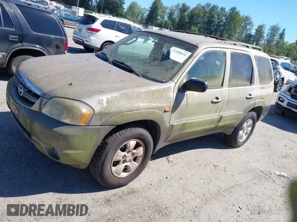 ✅ 2001 Mazda Tribute LX • VIN: 4F2CU08111KM29927 • Лот: 42750632. Опубликован ранее на IAAI с пробегом 206 174 миль. Бесплатный доступ к архиву аукционных продаж из США и подробный отчёт об истории автомобиля на DreamBid. Изображение 2.