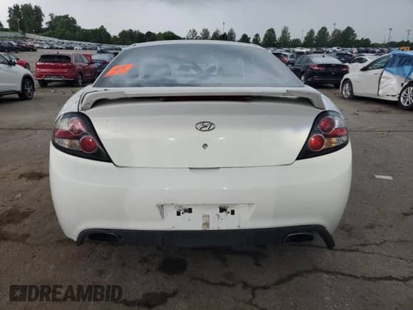 2008 Hyundai Tiburon GS с VIN KMHHM66DX8U278537, выставлен на аукционе Copart как лот 62597005 с пробегом Не указан миль и Списание • Salvage title. История ставок и продаж доступна на DreamBid. Изображение 6.