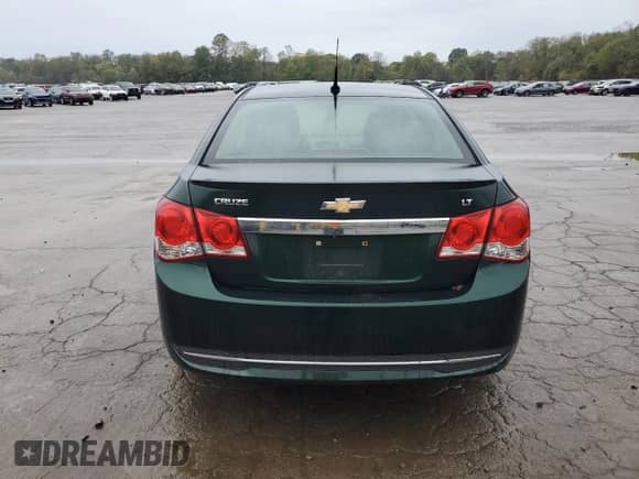 2014 Chevrolet Cruze 1LT с VIN 1G1PC5SB2E7471625, выставлен на аукционе Copart как лот 85270415 с пробегом 94 361 миль миль и Списание • Salvage title. История ставок и продаж доступна на DreamBid. Изображение 6.