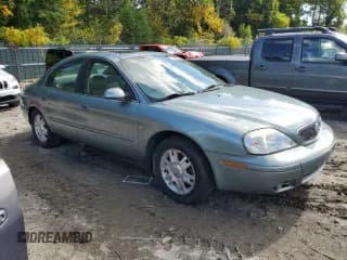 ✅ 2005 Mercury Sable LS • VIN: 1MEFM55S95A605902 • Lot: 73498184. Wystawiony na Copart z przebiegiem Nie podano. Bezpłatny archiwum sprzedaży aukcyjnych z USA i szczegółowy raport historii pojazdu na DreamBid. Zdjęcie 4.