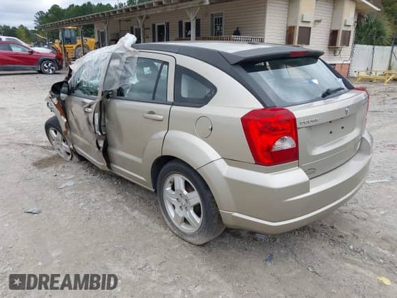 2009 Dodge Caliber SXT z VIN 1B3HB48A09D144835, wystawiony jako IAAI lot #41591982 z przebiegiem Nie podano mil oraz . Historia ofert i sprzedaży dostępna na DreamBid. Obrazek 3.