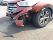 ✅ 2014 Hyundai Santa Fe • VIN: 5XYZTDLB0EG208769 • Lot: 42485411. Wystawiony na IAAI z przebiegiem 82 173 mil. Bezpłatny archiwum sprzedaży aukcyjnych z USA i szczegółowy raport historii pojazdu na DreamBid. Zdjęcie 6.