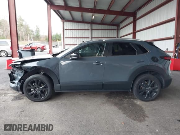 ✅ 2024 Mazda CX-30 S Carbon Edition • VIN: 3MVDMBCMXRM650611 • Lot: 43619427. Wystawiony na IAAI z przebiegiem 34 494 mil. Bezpłatny archiwum sprzedaży aukcyjnych z USA i szczegółowy raport historii pojazdu na DreamBid. Zdjęcie 14.