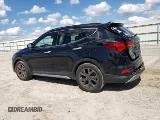 ✅ 2018 Hyundai Santa Fe Ultimate • VIN: 5XYZW4LA5JG524984 • Лот: 48900893. Опубликован ранее на Copart с пробегом Не указан. Бесплатный доступ к архиву аукционных продаж из США и подробный отчёт об истории автомобиля на DreamBid. Изображение 2.