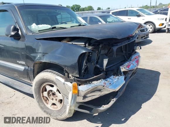 ✅ 2005 GMC Yukon SLE • VIN: 1GKEC13V55R124251 • Lot: 42570095. Wystawiony na IAAI z przebiegiem 265 431 mil. Bezpłatny archiwum sprzedaży aukcyjnych z USA i szczegółowy raport historii pojazdu na DreamBid. Zdjęcie 12.