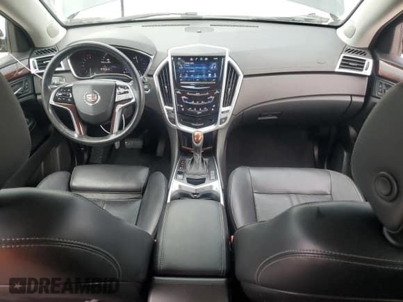 ✅ 2015 Cadillac SRX Premium Collection • VIN: 3GYFNDE39FS623019 • Lot: 69189535. Listed on Copart with 82,679 mi. Free auction sales archive from the USA and detailed vehicle history report at DreamBid. Image 8.
